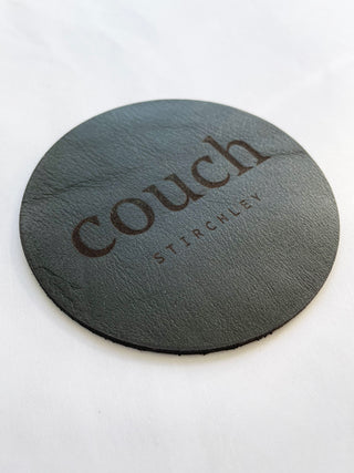 Coasters with a logo de bossed on them.