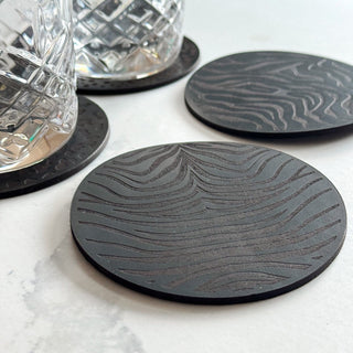 Tiger print black leather coasters